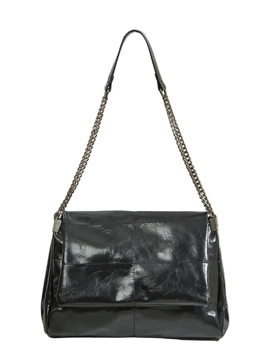 Florence Maxi — Gran Capacidad con Estilo Impecable